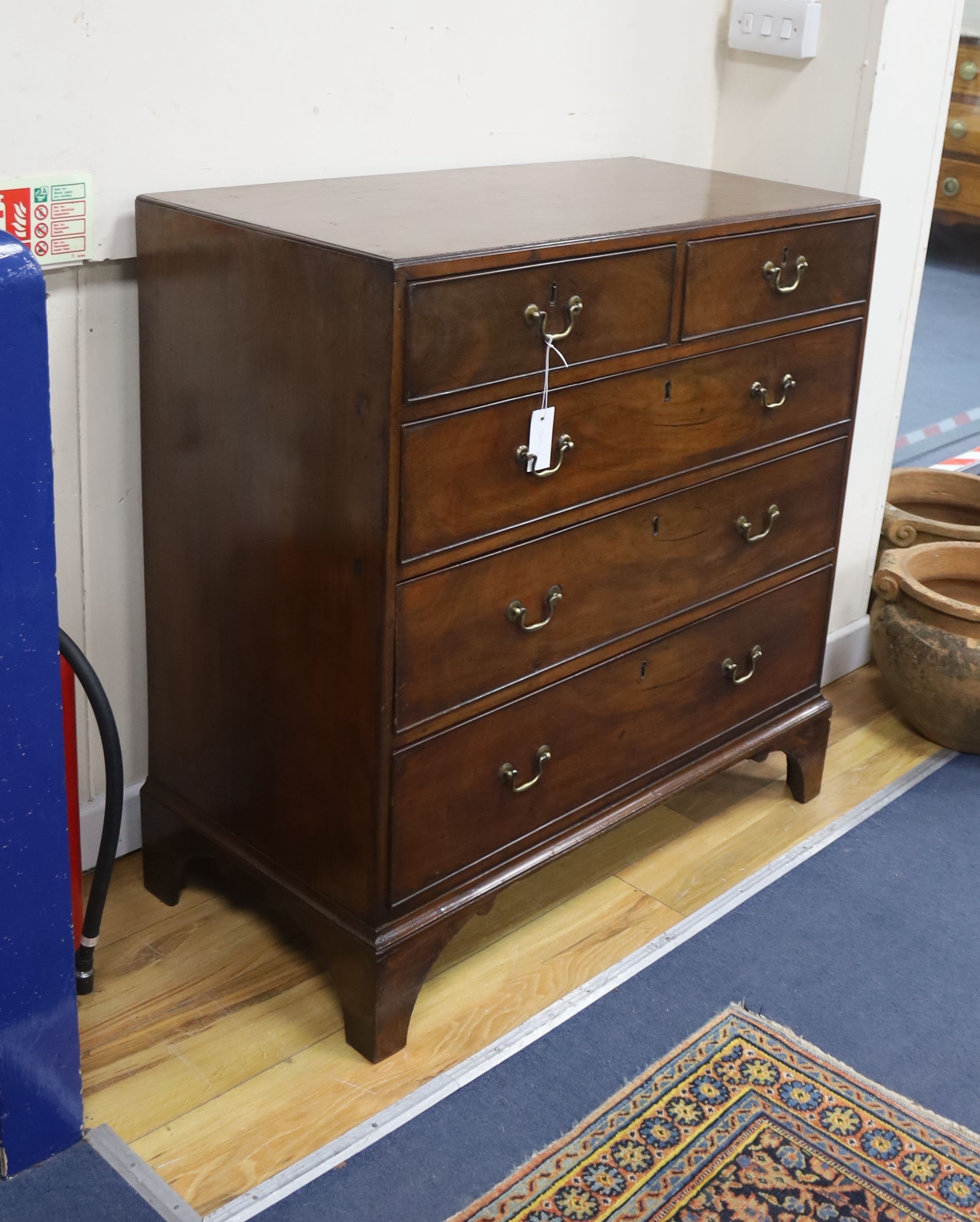 A George III mahogany chest, width 91cm, depth 45cm, height 94cm